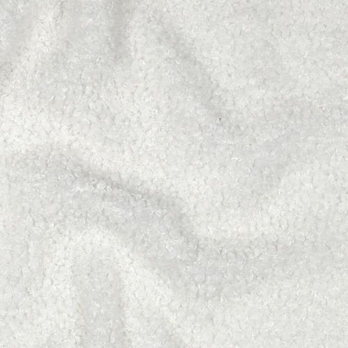 Miękkie i puszyste sztuczne futerko w odcieniu śmietankowym, idealne do szycia odzieży lub dodatków