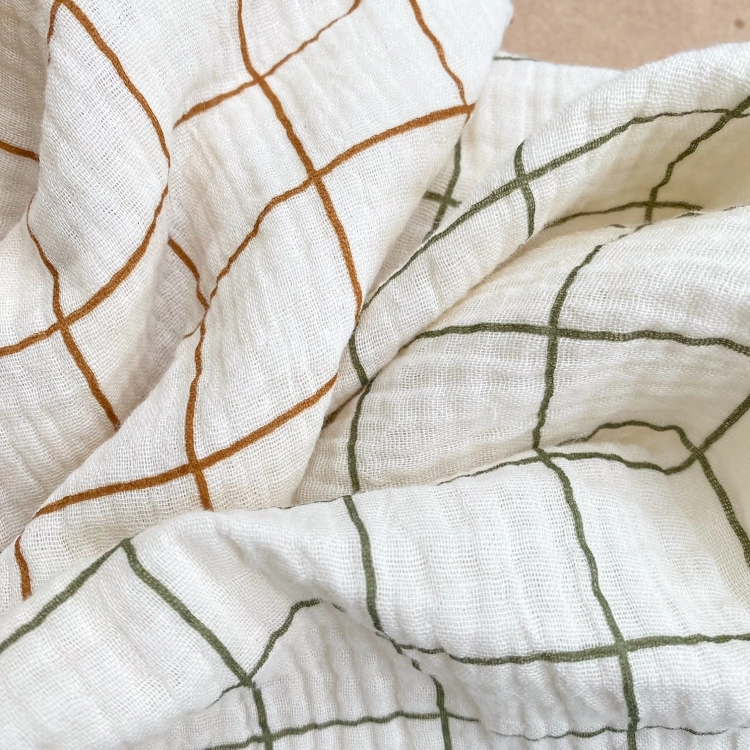 Muślin w kratkę na waniliowym tle