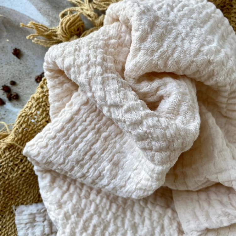 Muślin z elastyczną nicią w kolorze waniliowym