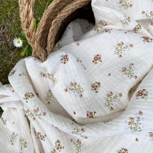 Muślin w kwiatuszki na waniliowym tle