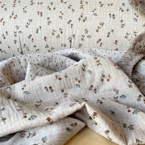 Tkanina muślin drukowany dwustronnie w kolorze beżowym