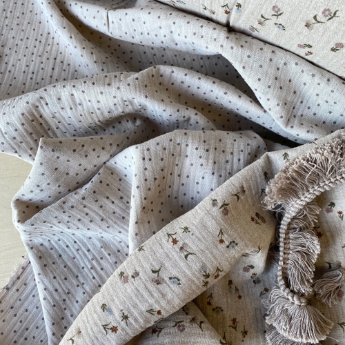 Materiał muślin drukowany dwustronnie beżowy